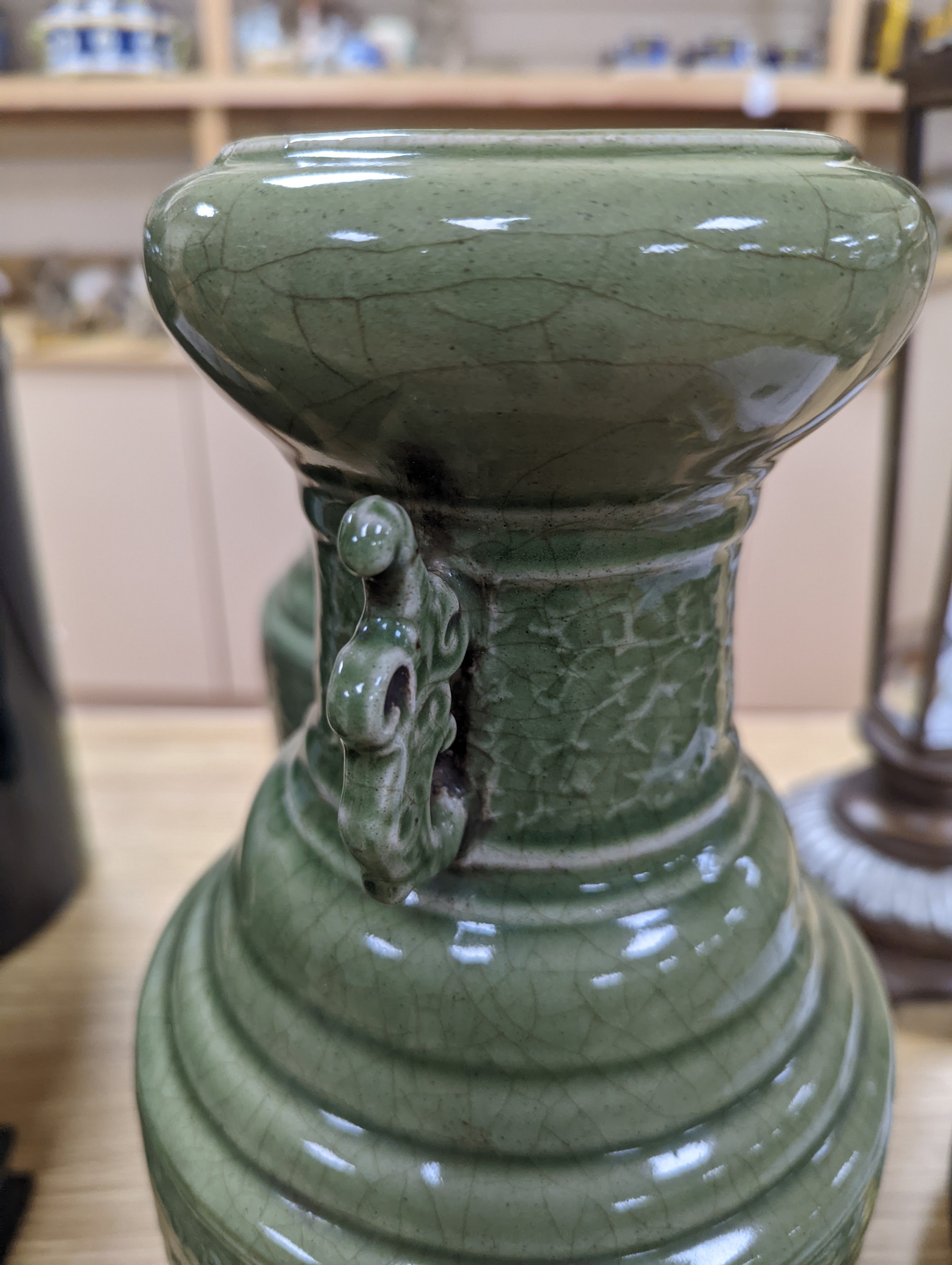 A pair of Chinese celadon glazed vases 35cm